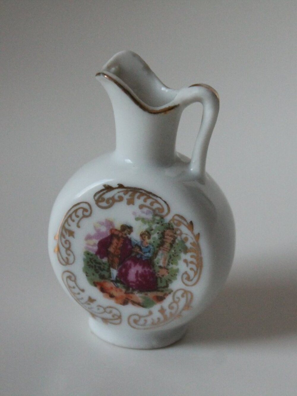 Miniature White Pitcher with Romantic Scene